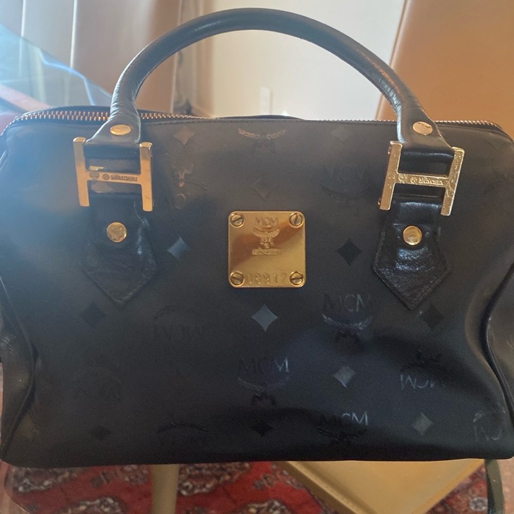 MCM Black Satchel Bag with Gold Accents